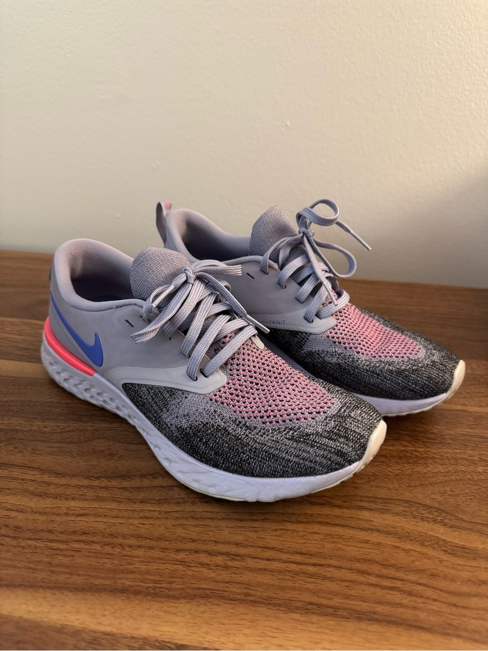 Nike Women's Gray, Pink & Blue Flyknit Running Sneakers